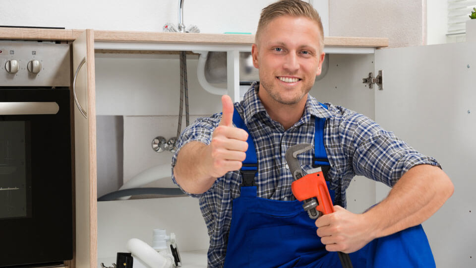 Plumber giving thumbs-up