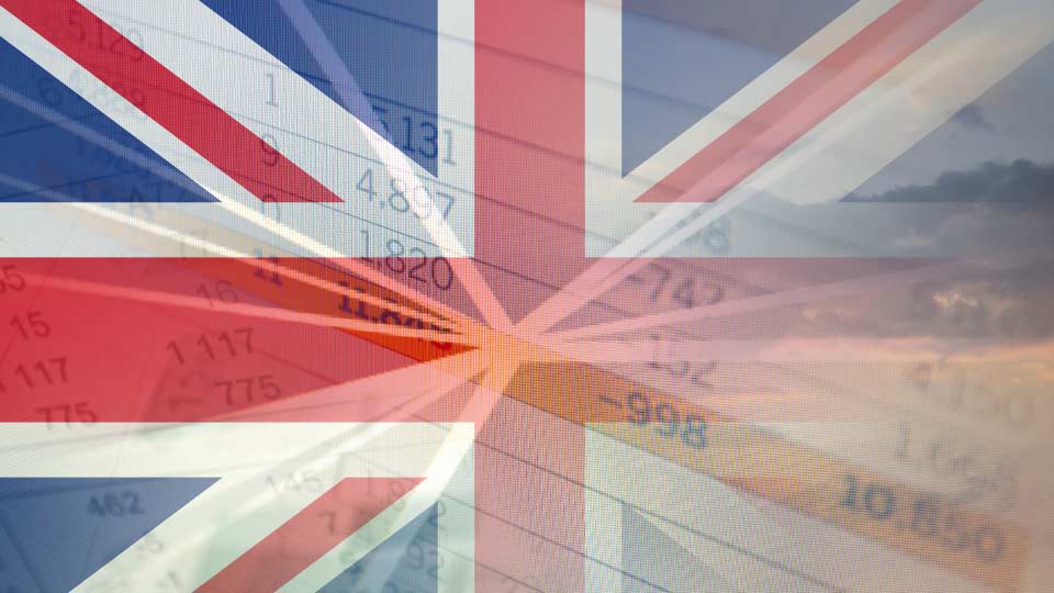 Flag of the United Kingdom superimposed over accounting data