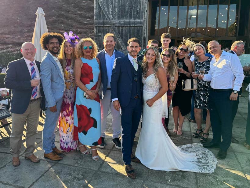 A group of people at a wedding celebration
