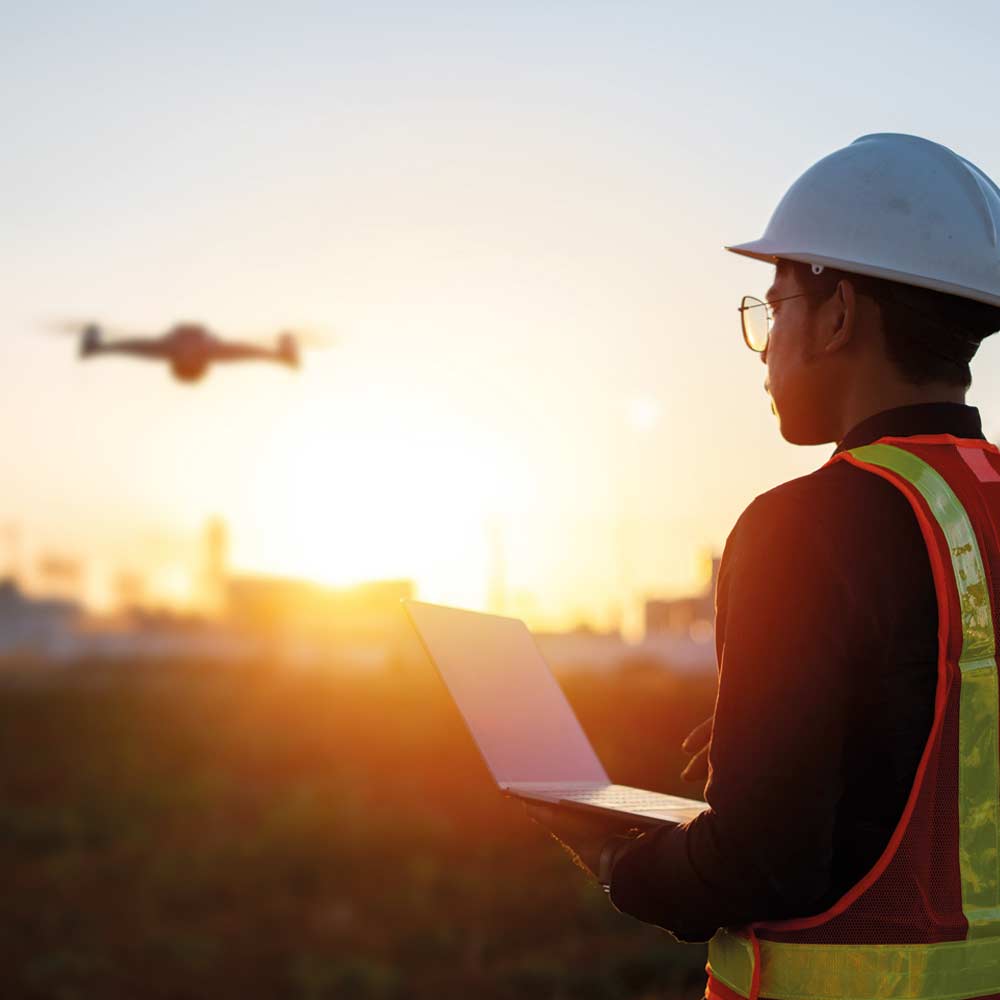 Field service worker using a drone on site