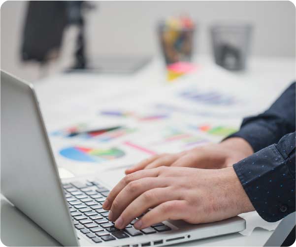 office worker using laptop computer