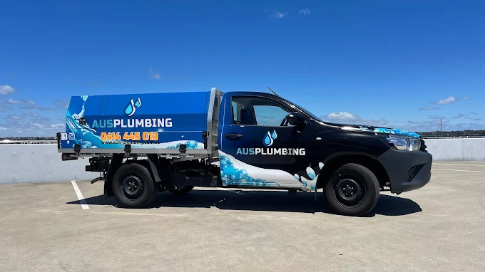 utility vehicle with wrap for plumbing business