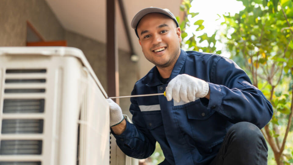 HVAC Technician working on equipment