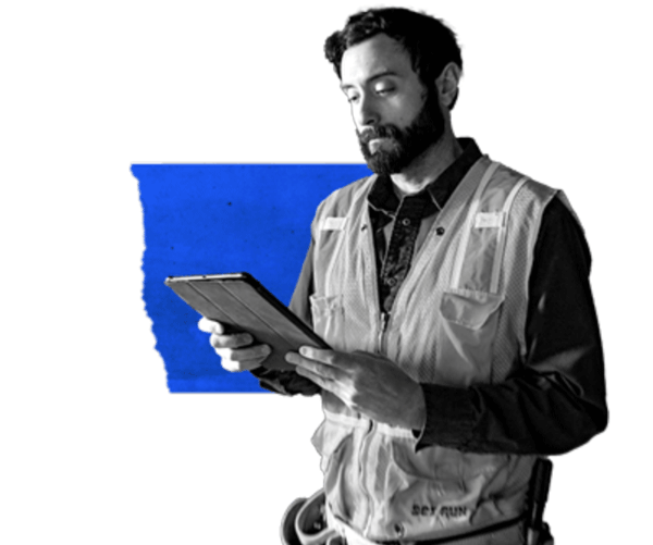 Tradesperson using mobile device