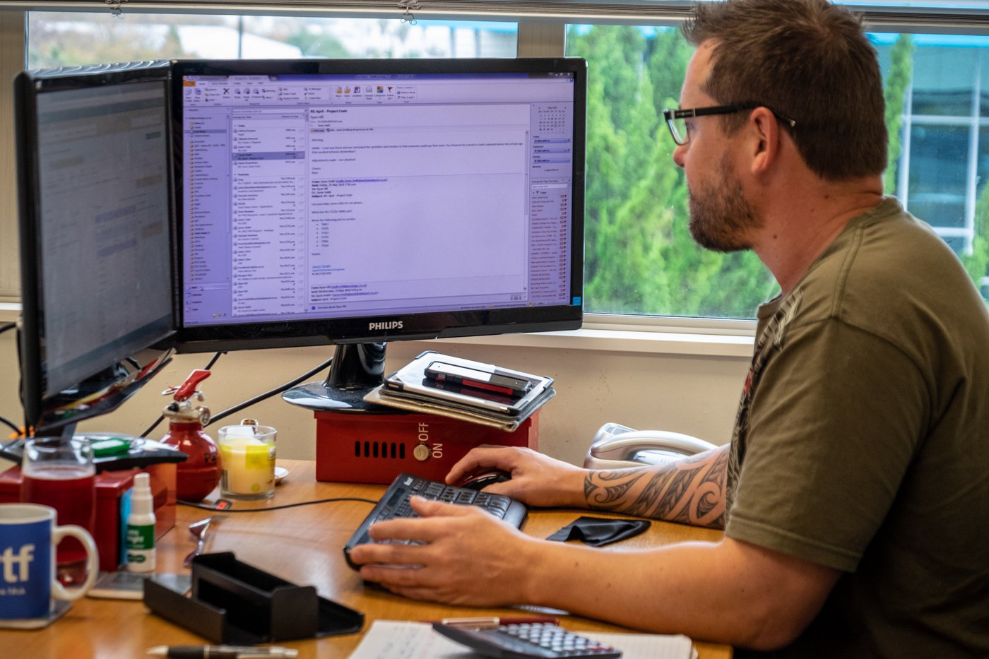 Armitage Group worker sitting at a computer desk