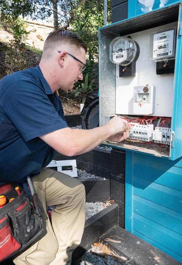 DC Electrical technician working on site