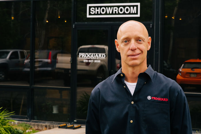 Frank Bauer standing in front of Proguard Offices