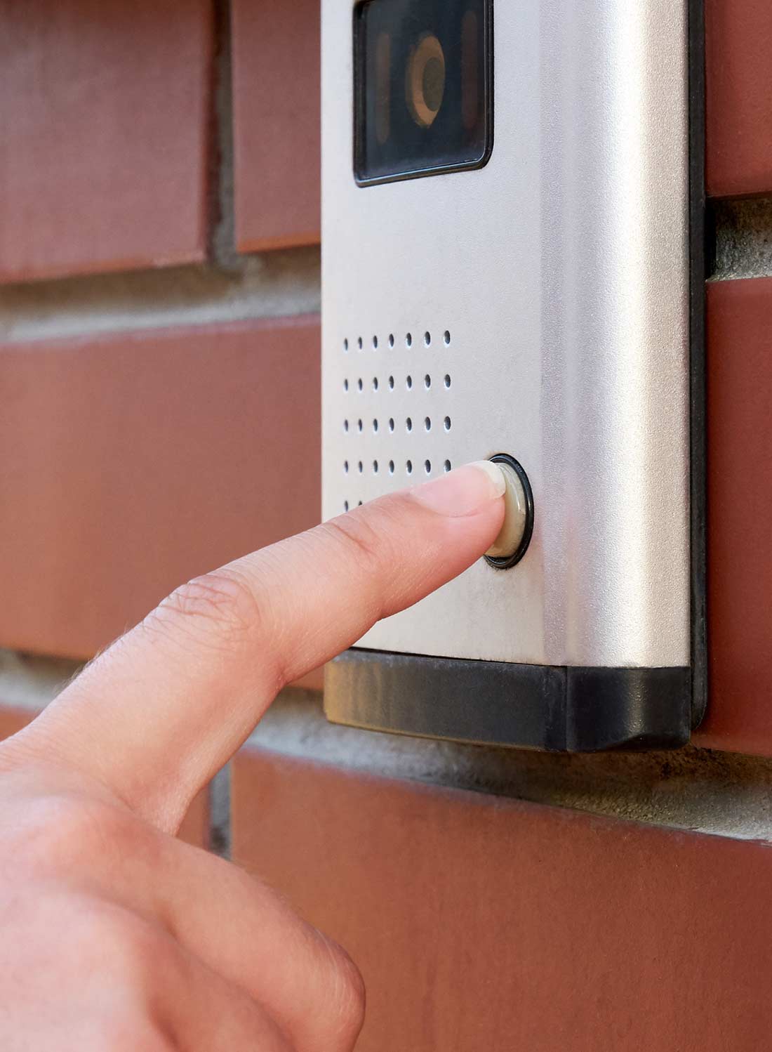 finger on security doorbell