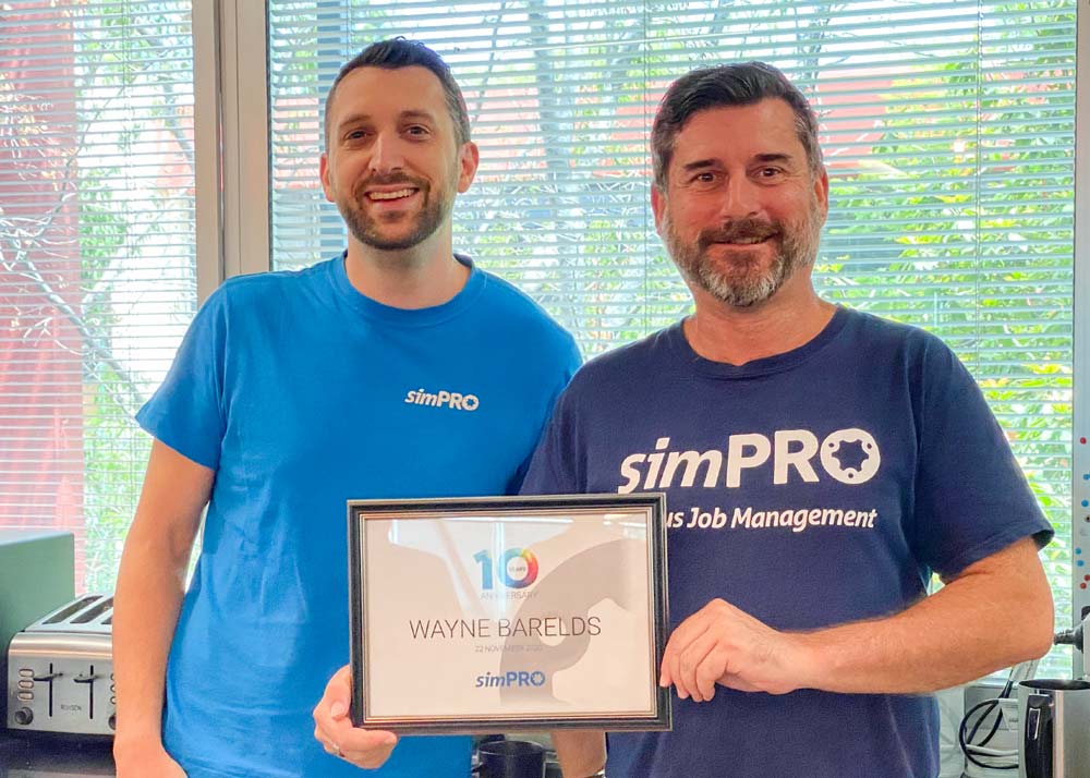 Simpro Chief Technology Officer Rob Ormond and Wayne Barelds.