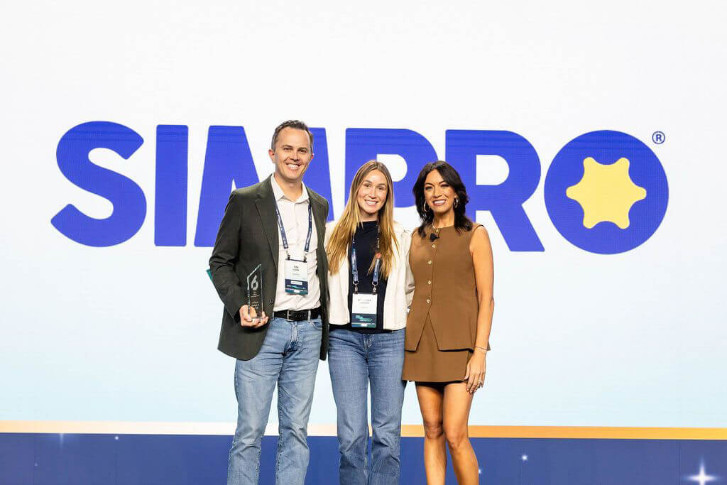 Simpro team accepting the AI Game Changer of the Year award at 6Sense Breakthrough 2025.