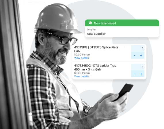 Tradesperson using mobile device