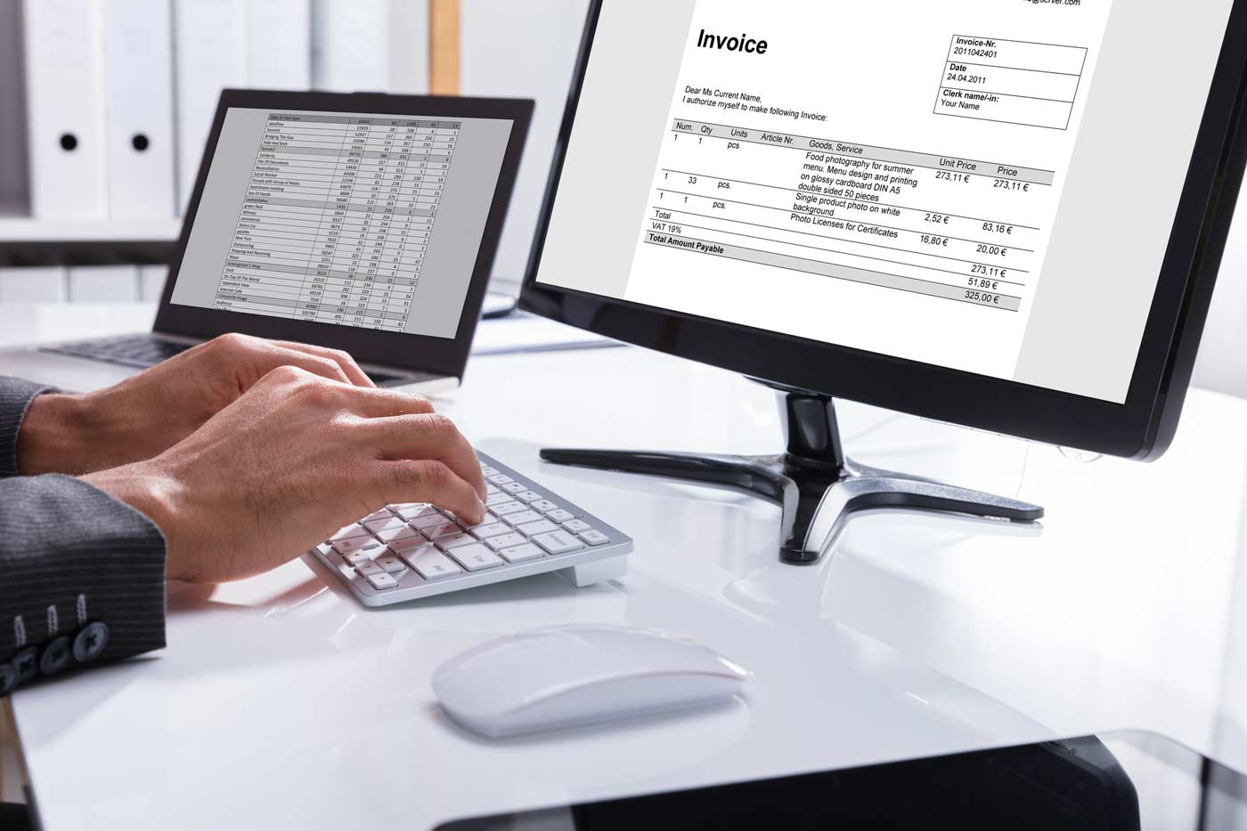 office worker creating electronic invoice